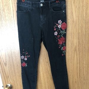 Embroidered black skinny jeans